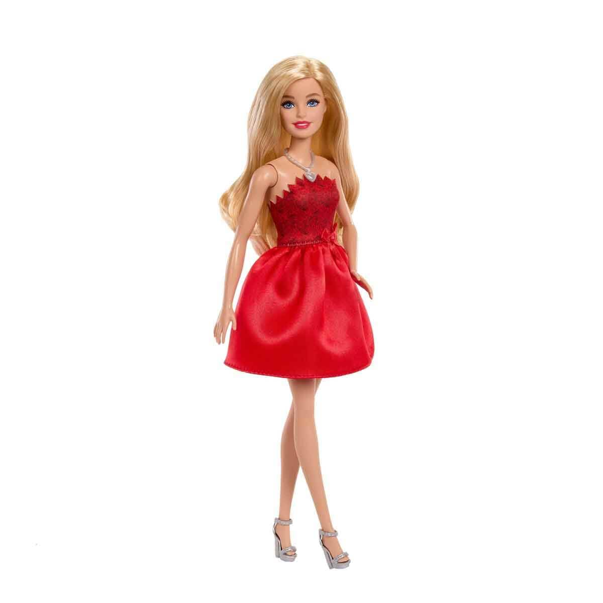 Barbie 80th Anniversary blonde fashion doll in a red dress, silvery shoes, and necklace, posing elegantly.