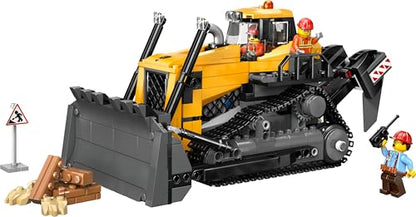 LEGO City yellow bulldozer building set with three minifigures, loose bricks, and road signs for construction play.