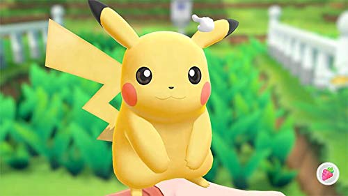 Nintendo Pokémon Let’s Go, Eevee! Nintendo Switch game cartridge with colorful Eevee and Pokémon artwork on the cover.