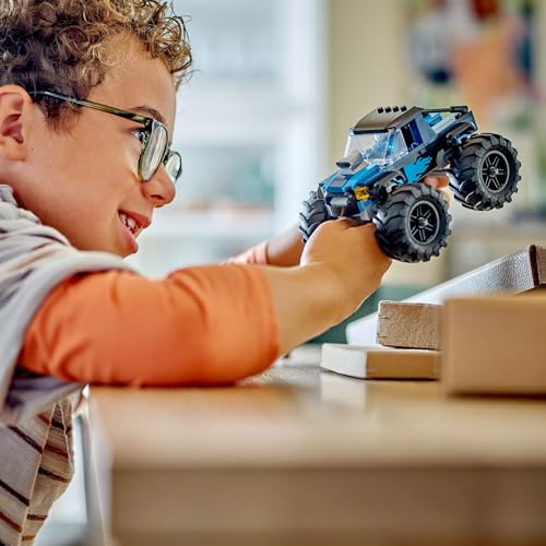 LEGO City blue monster truck toy with driver minifigure, designed for kids 5 and up, featuring vibrant colors and details.