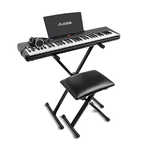 Alesis Melody 61 keyboard piano with 61 keys, built-in speakers, stand, bench, headphones, tablet stand, and colorful controls.