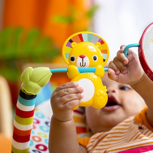 Bright Starts Playful Pinwheels Bouncer with colorful fabric, soft padding, and a removable toy bar for infants' entertainment.