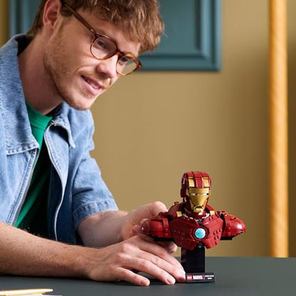 LEGO Marvel Iron Man MK4 Bust model set with Tony Stark minifigure, shoulder cannons, and rotating head for display.