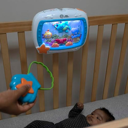 Baby Einstein Sea Dreams Soother crib toy with remote, calming lights and melodies for newborns and infants.