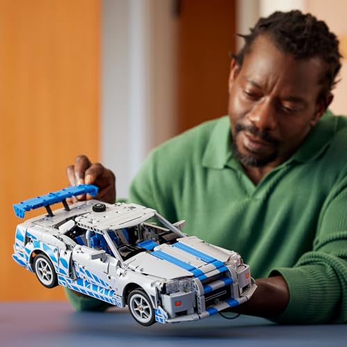 LEGO Technic Nissan Skyline GT-R (R34) car model kit featuring drift function, steering, and detailed engine components.