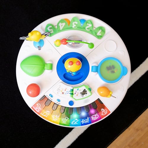 Baby Einstein Around We Grow 4-in-1 walker and activity center with colorful toys for babies aged 6 months and up.