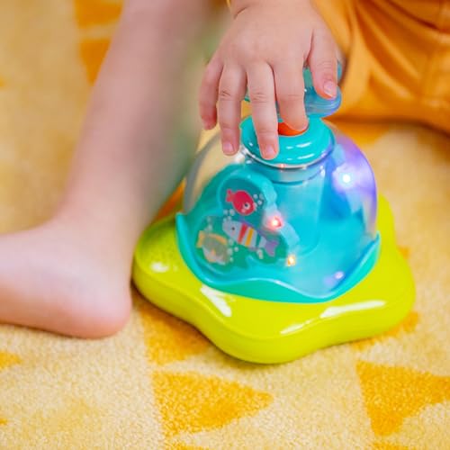 Bright Starts Press and Glow Spinner musical baby toy with multicoloured spinning parts, designed for infants 6 months and older.