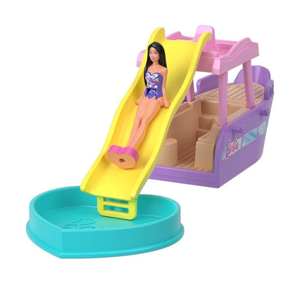 Mini BarbieLand set with 1.5-inch Barbie doll, dream boat with color-change feature, detachable slide, and pool for imaginative play.