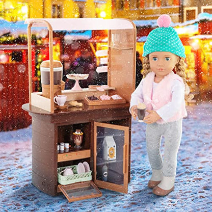 Our Generation Choco-Tastic Playset with hot chocolate stand and 26 accessories for 18-inch dolls, featuring colorful details.