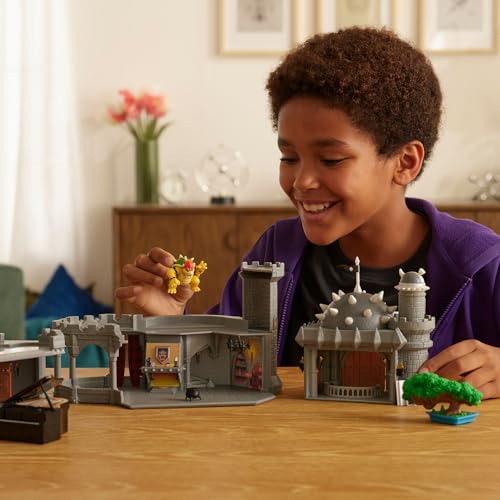 Super Mario Galaxy Movie Bowser Castle playset with mini Bowser figure, character accessories, and three playable levels.