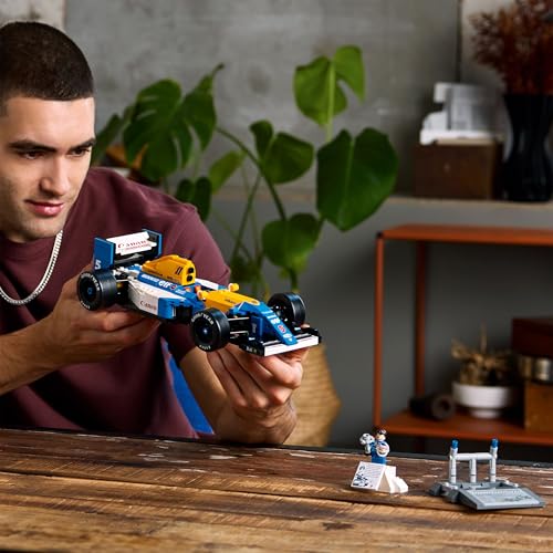 LEGO Icons Williams Racing FW14B model set with Nigel Mansell minifigure, trophy, and display stand for motorsport fans.