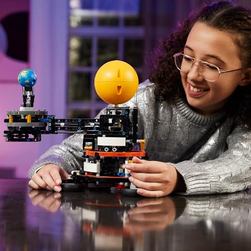 LEGO Technic Planet Earth and Moon model set showcasing a detailed solar system design for imaginative play.