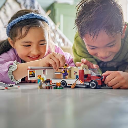 LEGO City Holiday Adventure Camper Van toy with three minifigures and camping accessories for creative building fun.