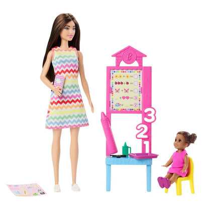 Barbie Teacher Doll with brunette hair, printed dress, toddler, and teaching accessories for educational pretend play.