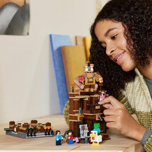 LEGO Minecraft Woodland Mansion Fighting Ring set with Baby Zombie, Steve, Garret, and Henry minifigures in action.