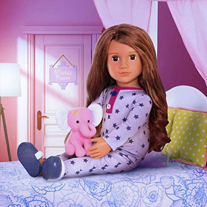 Our Generation Maria fashion doll in pink pyjama onesie holding an elephant plush toy, poseable doll for kids aged 3 to 12.