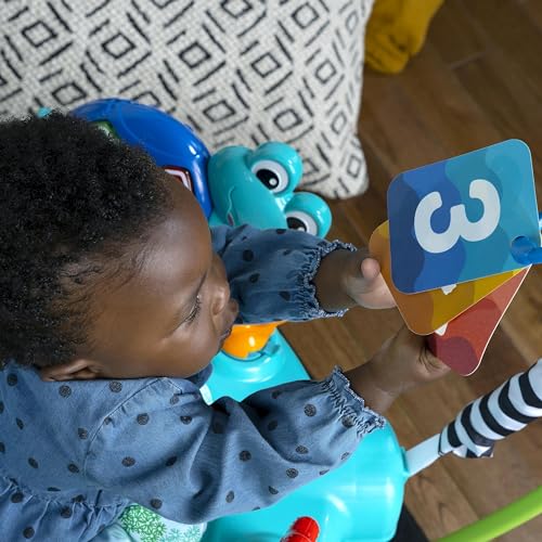 Baby Einstein Ocean Explorers Curiosity Cove 2-in-1 baby activity jumper and floor toy for infants 6-12 months, featuring colorful ocean-themed toys.
