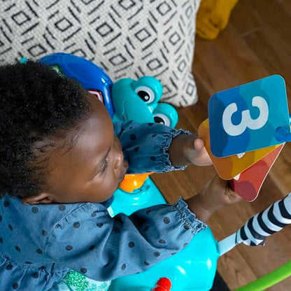 Baby Einstein Ocean Explorers Curiosity Cove 2-in-1 baby activity jumper and floor toy for infants 6-12 months, featuring colorful ocean-themed toys.