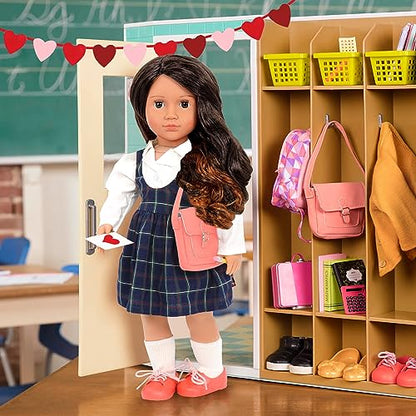 Our Generation 18-inch doll outfit featuring a stylish school uniform and classroom supplies in an 8-piece set.