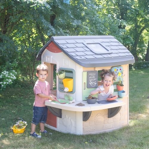 Smoby Life Mud Cooking House with play kitchen, utensils, and mud-themed accessories for outdoor imaginative play.
