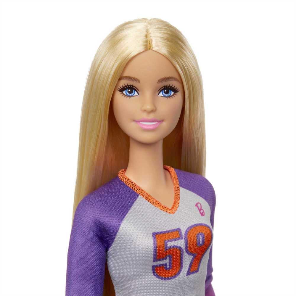 Barbie Made to Move volleyball player doll in uniform with volleyball and accessories, showcasing dynamic pose and details.
