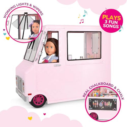 Our Generation pink ice cream truck playset for 18-inch dolls with various accessories displayed around it.