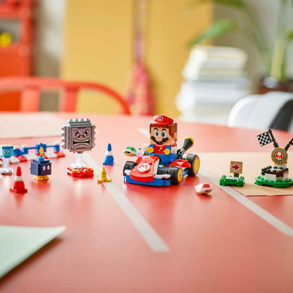 LEGO Mario Kart interactive toy race course with Mario, kart, figures, podium, barriers, and colorful race track for kids.