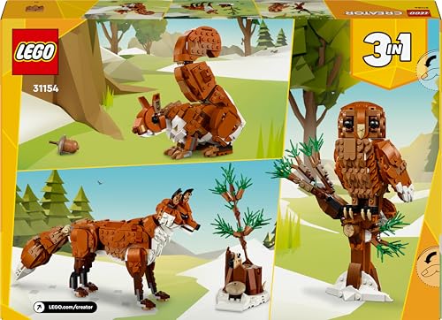 LEGO Creator 3in1 Forest Animals set displaying a red fox, owl, and squirrel models in a woodland scene.