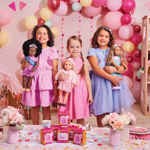 Our Generation pink mini fridge with play food accessories for 46cm dolls, featuring a realistic design for imaginative play.
