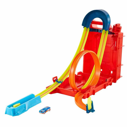 Hot Wheels Track Builder Unlimited Fuel Can Stunt Box with track pieces and storage for toy cars, suitable for ages 6 to 12.