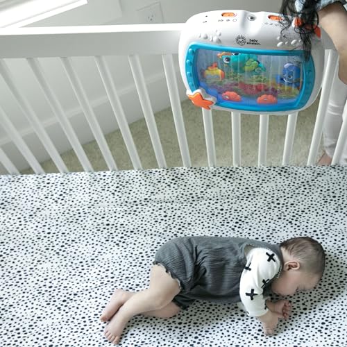 Baby Einstein Sea Dreams Soother crib toy with remote, calming lights, melodies, and sleep aid features for newborns and infants.