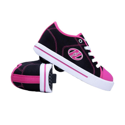 Heelys girls' black, white, and hot pink skate shoes with wheels, size 3 UK, featuring stylish design and durable construction.