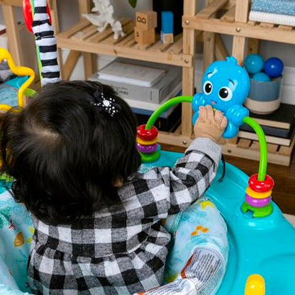 Baby Einstein Ocean Explorers Curiosity Cove 2-in-1 activity jumper and floor toy for infants 6-12 months, featuring colorful ocean-themed toys.