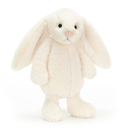 Cream Bashful Bunny by Jellycat, medium size, featuring soft fur and floppy ears, set against a neutral background.