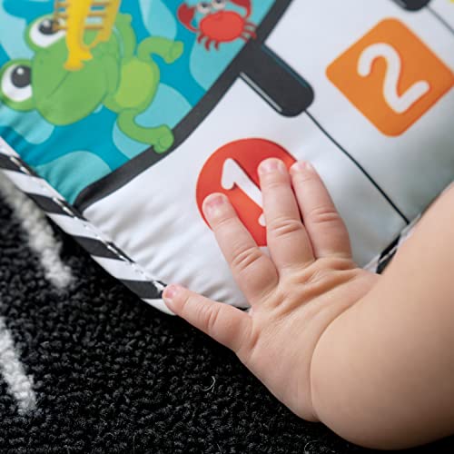 Baby Einstein Ocean Explorers Neptune's Kick & Explore musical crib toy with ocean-themed marine character for infants 0 months and up.