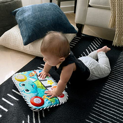 Baby Einstein Ocean Explorers Neptune's Kick & Explore musical crib toy with colorful ocean-themed design for babies 0 months and up.