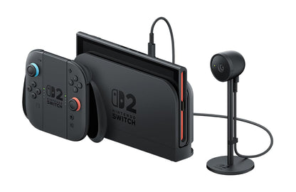 Nintendo Switch 2 Camera attached to the console, showing its sleek design and lens for capturing photos and videos.