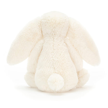 Cream Bashful Bunny by Jellycat, medium size, featuring soft fur and floppy ears, ideal for cuddly companionship.
