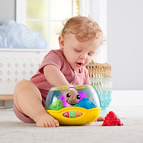 Fisher-Price Laugh & Learn Magical Lights Fishbowl toy with colorful fish and lights for infants 6+ months, featuring Smart Stages learning.