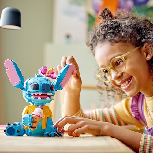 LEGO Disney Stitch toy figure holding an ice-cream cone and flower, perfect for Lilo & Stitch fans aged 9 and up.