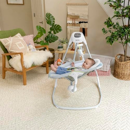 Ingenuity SimpleComfort baby swing with 6-speed options, multi-directional seat, vibrations, and nature sounds for infants 0-9 months.