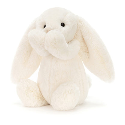 Cream Bashful Bunny plush toy by Jellycat, medium size, featuring soft fur and floppy ears, perfect for cuddling.