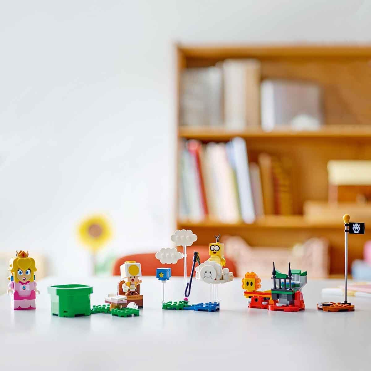 LEGO Super Mario Adventures playset featuring LEGO Peach, Yellow Toad figure, interactive Nintendo-themed toy for kids and gamers.