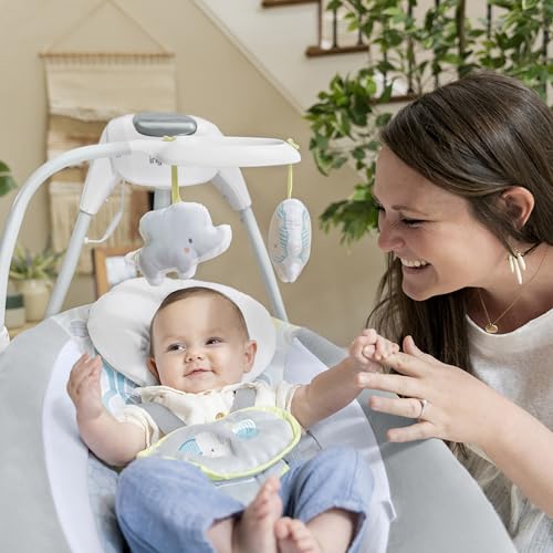 Ingenuity SimpleComfort baby swing with 6-speed multi-direction motion, vibrations, and nature sounds for infants 0-9 months.