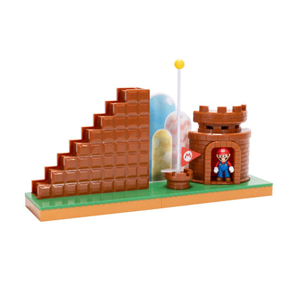 Super Mario 2.5-inch playset by JAKKS Pacific featuring a mini Mario figure, interactive stairs, castle, flagpole, and base platform.