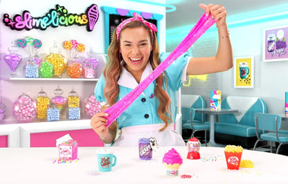 So Slime DIY Slimelicious Shaker kit with colorful slime powders, water, and decorations for creating scented, treat-inspired slime.