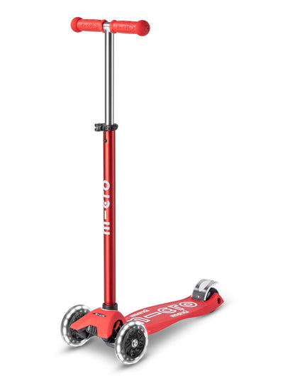 Red Maxi Micro LED Deluxe scooter with big wheels and adjustable handlebar for children ages 5-12, suitable for boys and girls.