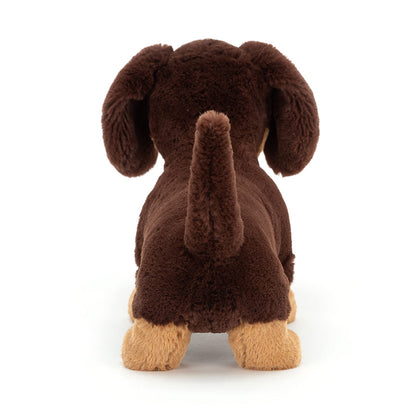 Jellycat Otto plush sausage dog toy, featuring a soft, cuddly dachshund design with floppy ears and a friendly expression.