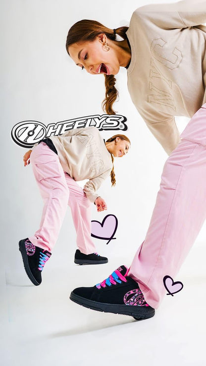 Heelys Digilo Nylon shoe in black and pink with wheels, size 6, featuring a sporty sneaker design by Heelys.