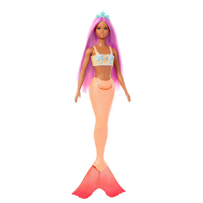 Barbie mermaid doll with pink fantasy hair, starfish bodice, and soft orange tail, wearing a headband accessory.